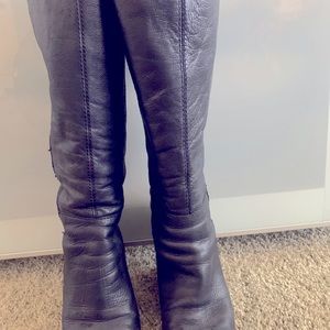 Below the knee wedge boots